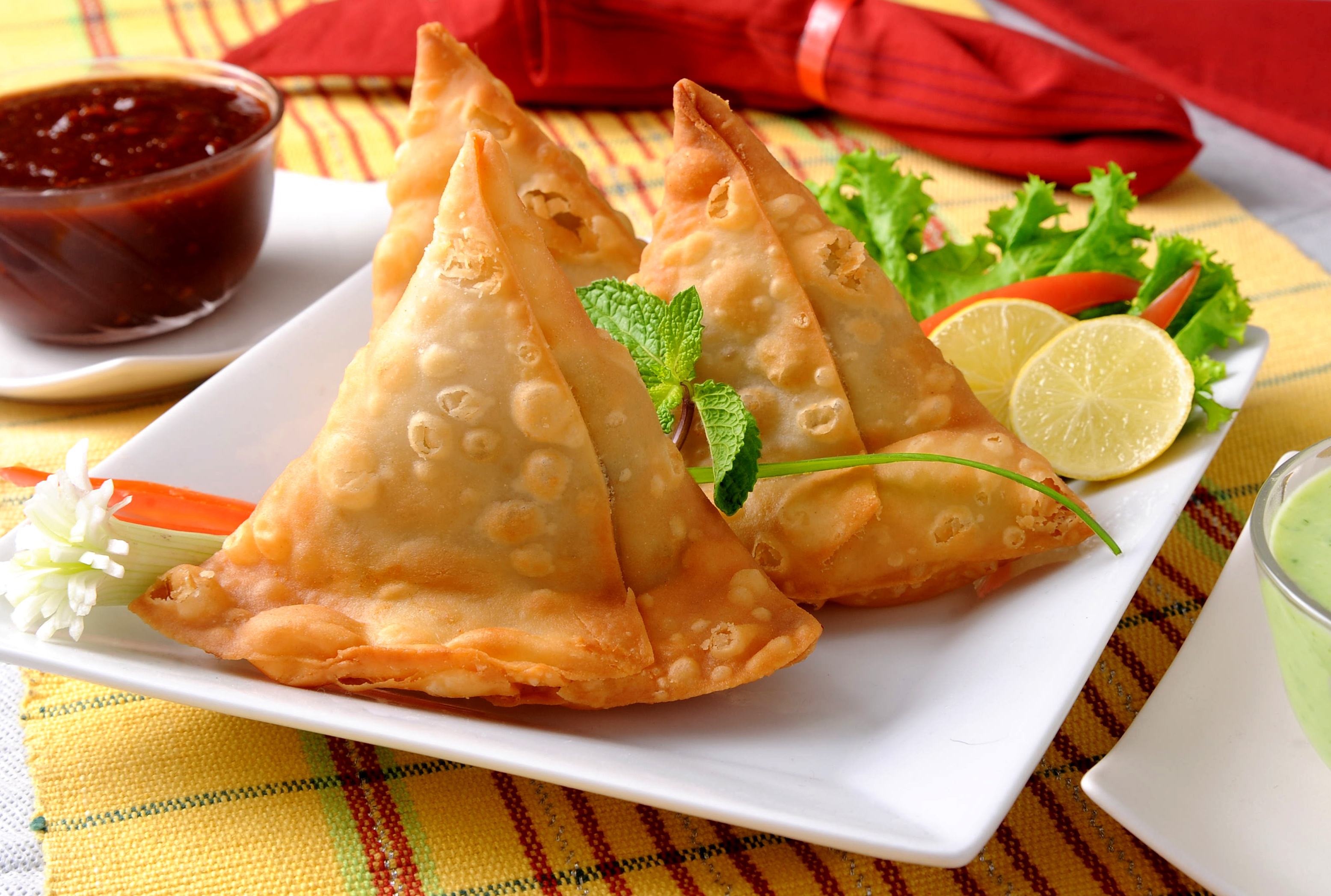 two samosas ona plate